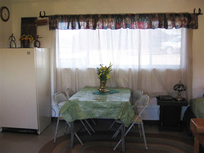 Dining table near a window in the bunkhouse