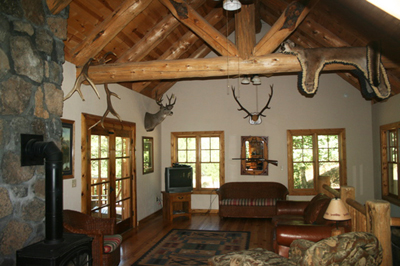 Grand view of the spacious lodge rock-walled main floor