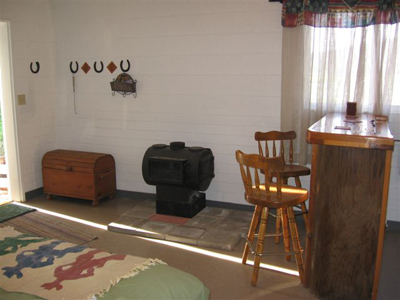 Another view of the kitchen bar area